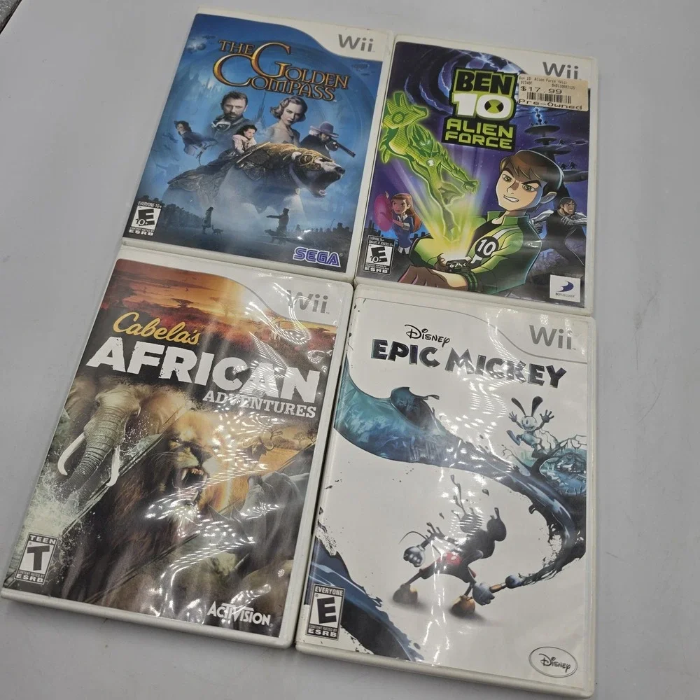 Nintendo Wii Mixed 4 Game Lot Golden Compass Ben10 Epic Mickey African Adventure